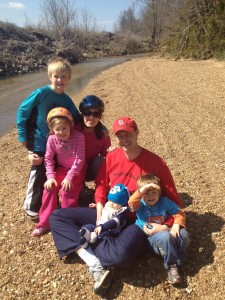 This is my family by a creek on a bike ride. 