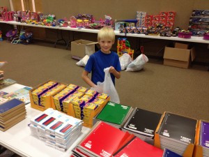 Austin helping with the books. 